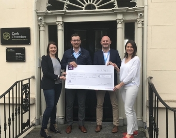 Katherine Fitzpatrick and Deirdre Griffin Cork Chamber, presenting John Dempsey and Darran Coyle Garde from Pieta House with a cheque for €710